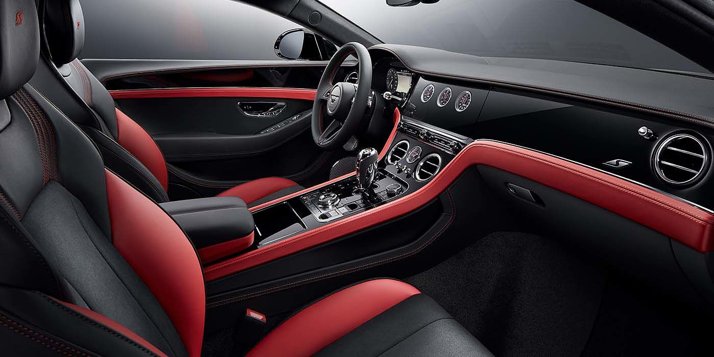 Bentley Praha Bentley Continental GT S coupe front interior in Beluga black and Hotspur red hide with high gloss Carbon Fibre veneer