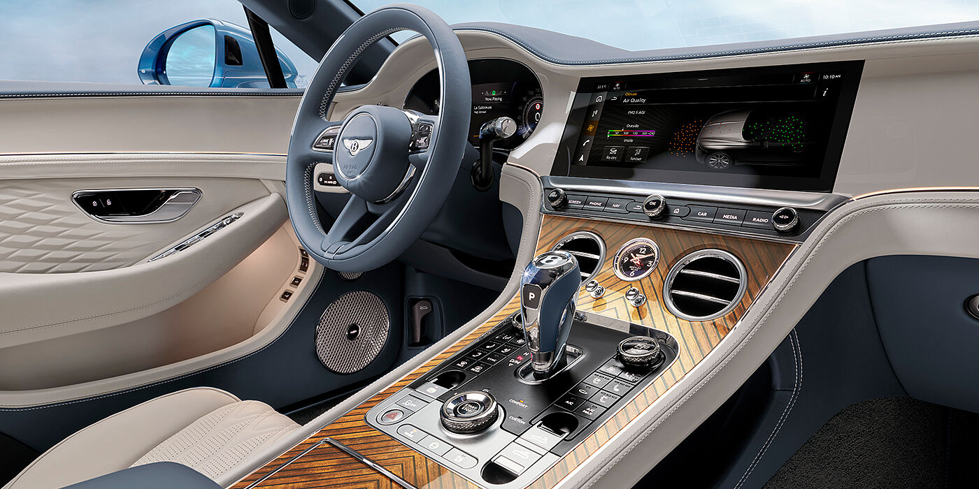 Bentley Praha New Bentley Continental GTC Azure convertible interior front cabin view with Linen and Brunel hides and Piano Linen by Mulliner veneer featuring centre console and centre MMI screen