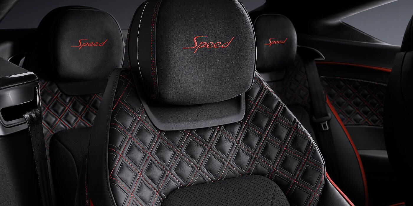 Bentley Praha Bentley Continental GT Speed coupe seat close up in Beluga black and Hotspur red hide