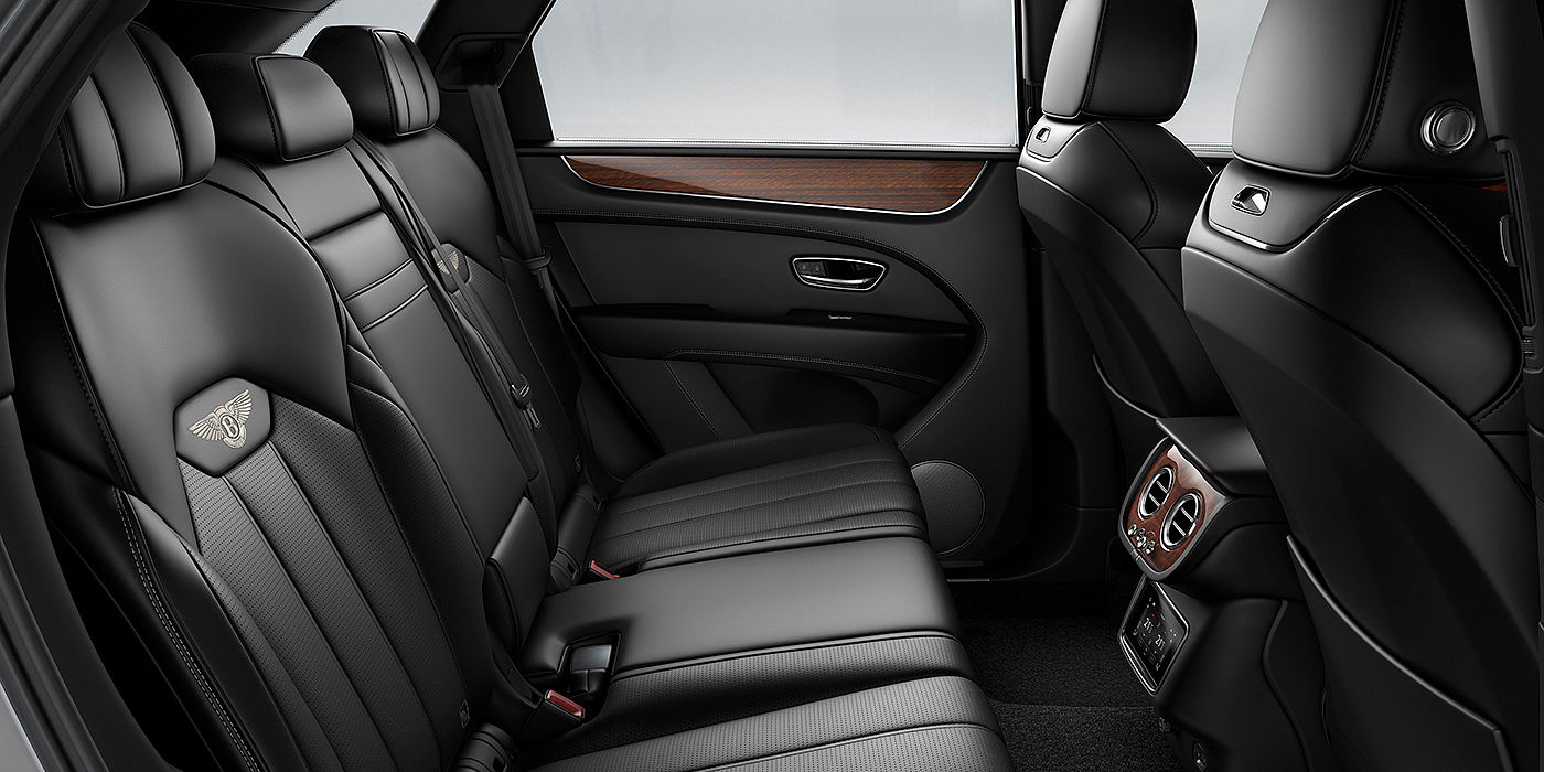 Bentley Praha Bentey Bentayga interior view for rear passengers with Beluga black hide.