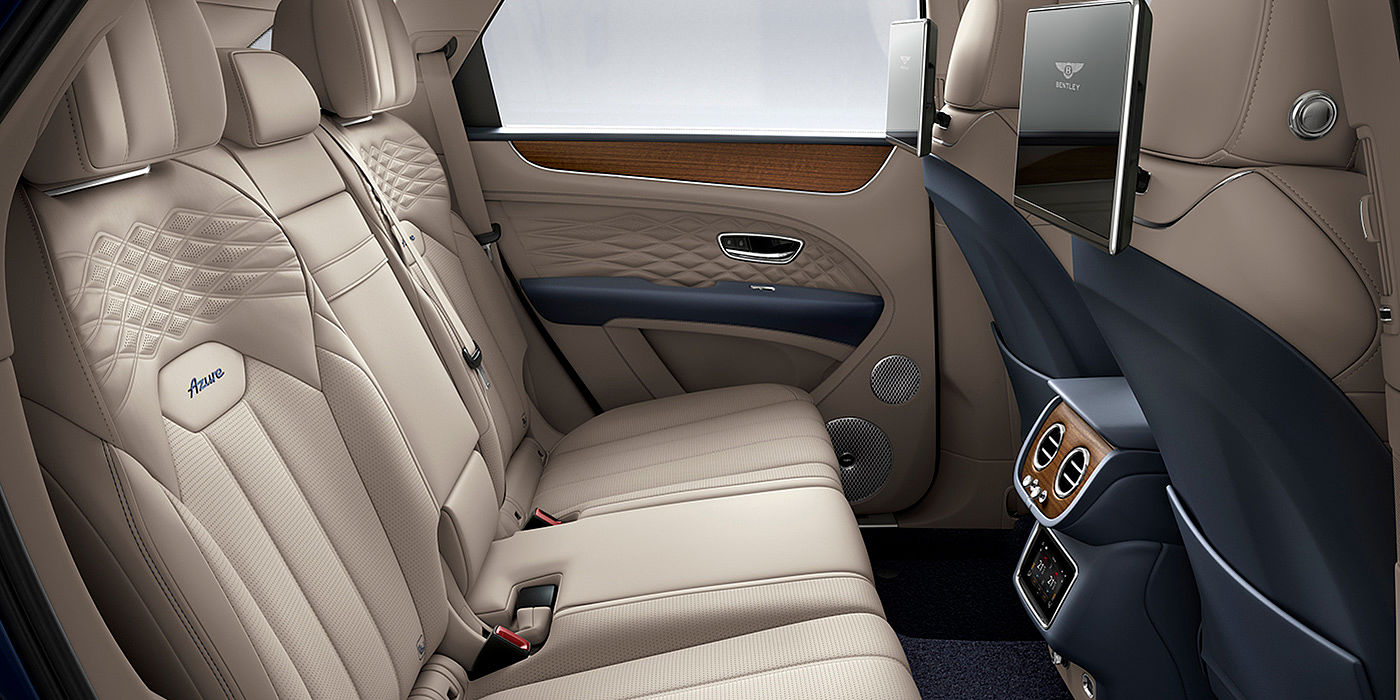 Bentley Praha Bentey Bentayga Azure interior view for rear passengers with Portland hide and Rear Seat Entertainment. 