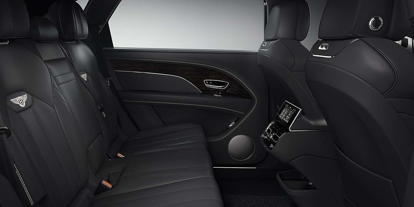 Bentley Praha Bentley Bentayga EWB SUV rear interior in Beluga black leather