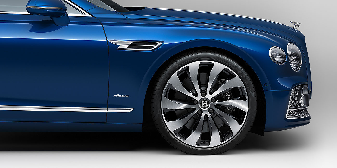 Bentley Praha Bentley Flying Spur Azure sedan side close up in Sequin Blue paint with Azure badge