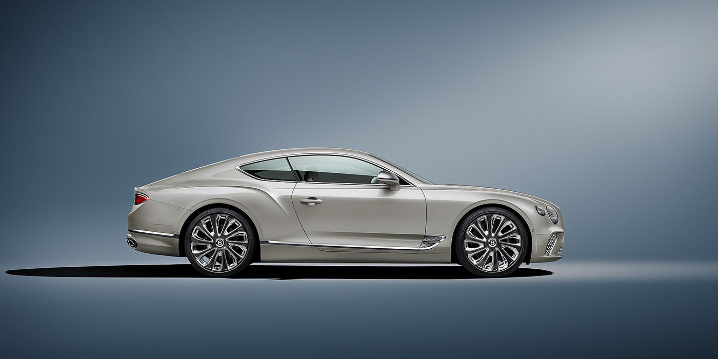 Bentley Praha Bentley Continental GT Mulliner coupe in White Sand paint front 34