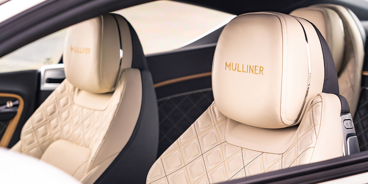 Bentley Praha Bentley Continental GT Mulliner coupe seat detail in Beluga black and Linen hide
