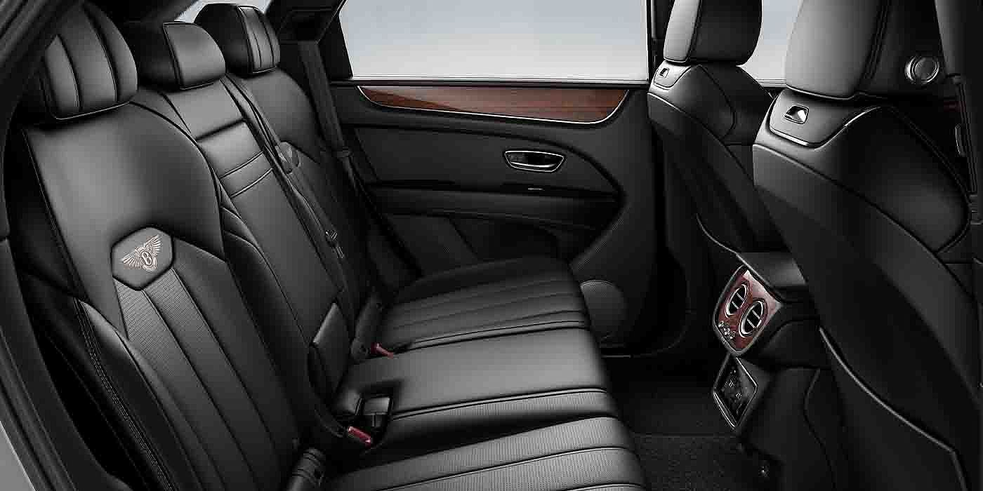 Bentley Praha Bentley Bentayga EWB interior view for rear passengers with Beluga black hide.
